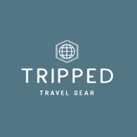 Tripped Travel Gear logo